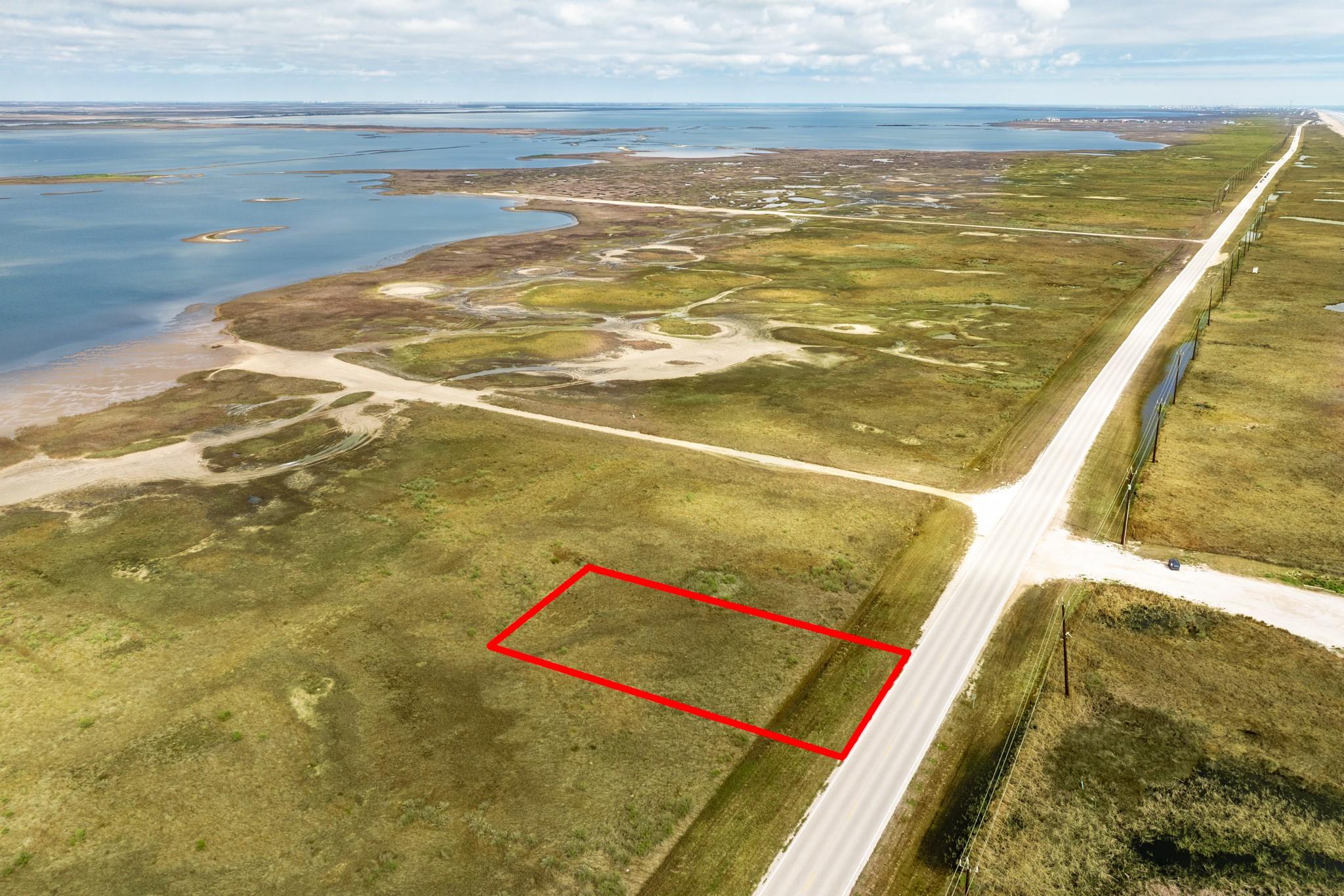 Image 4: Angled aerial showcasing the lot&rsquo;s proximity to bo