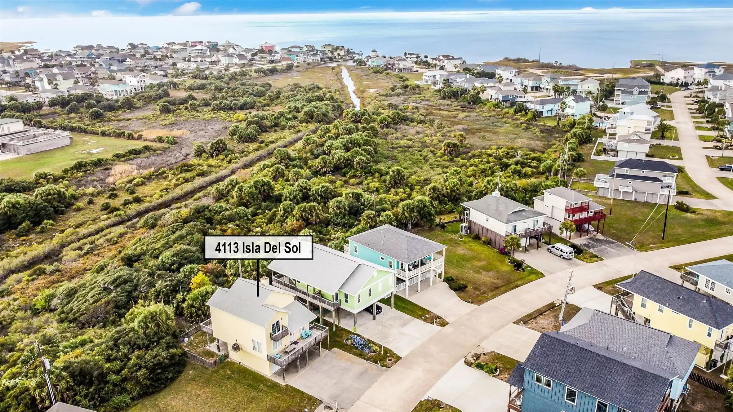 Image 1: Scenic aerial showcasing the home&rsquo;s ideal placemen