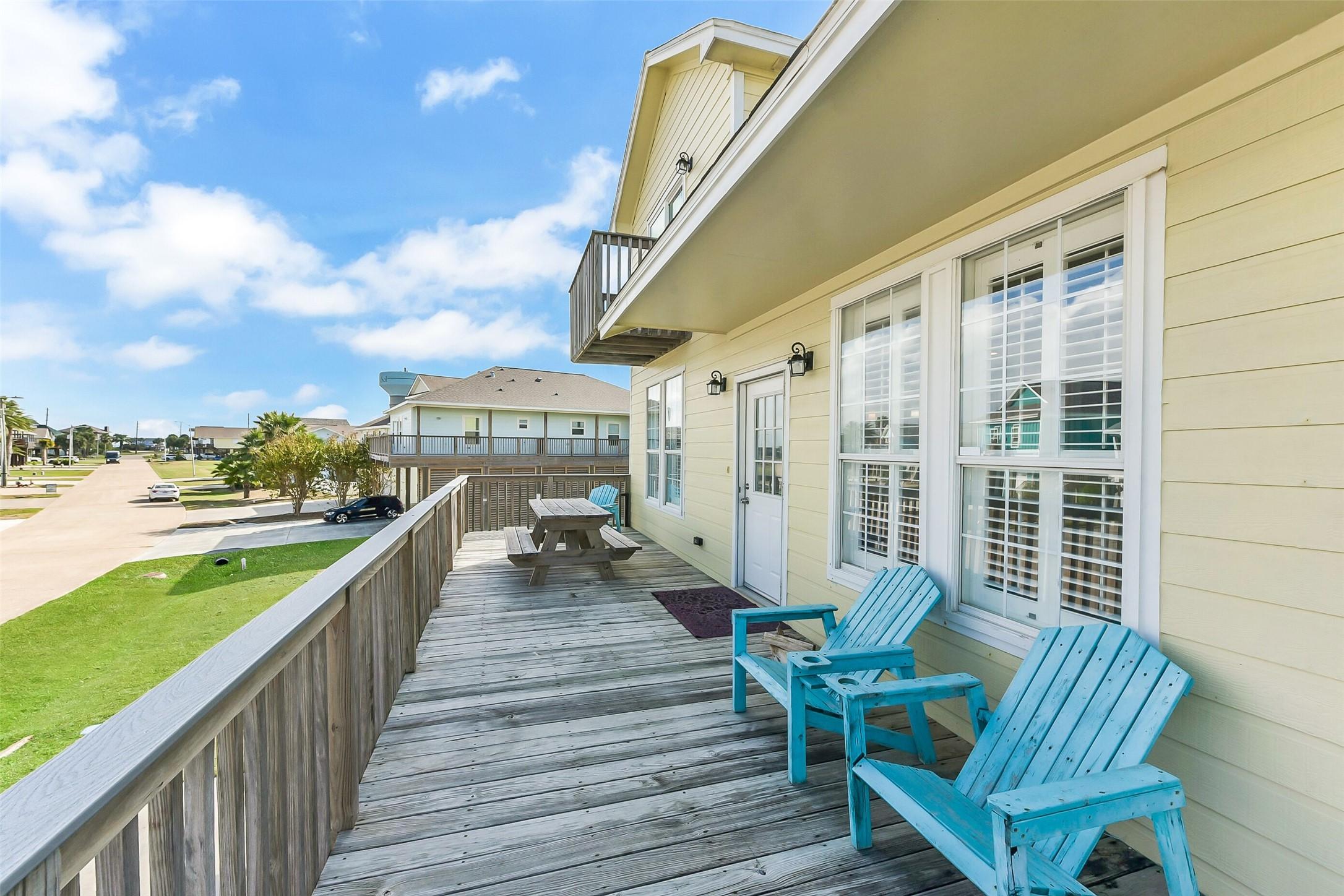 Image 4: The spacious front deck is perfect for enjoying th