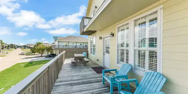 Image 4: The spacious front deck is perfect for enjoying th