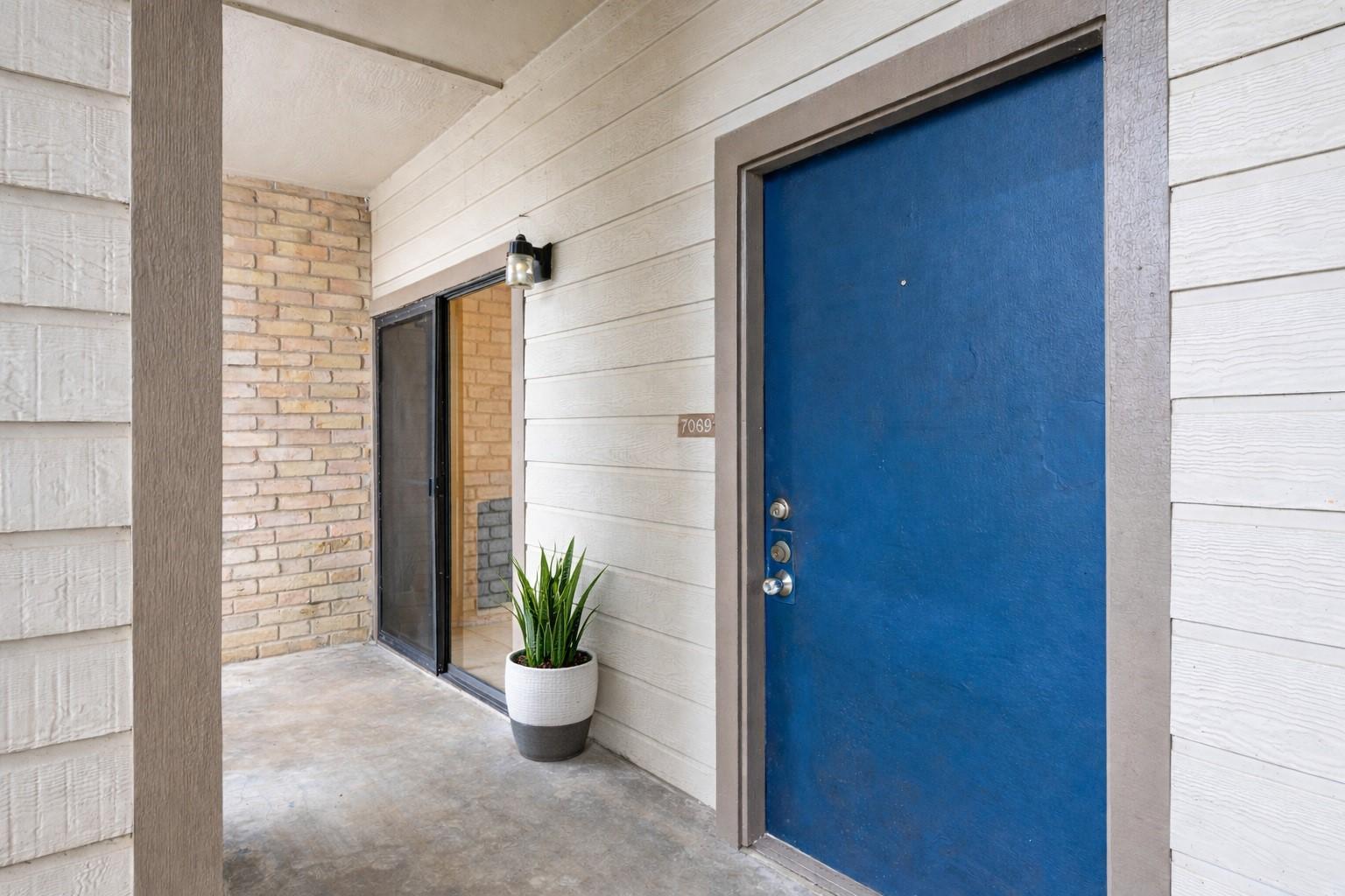 Image 3: Covered front entry with private access (virtually