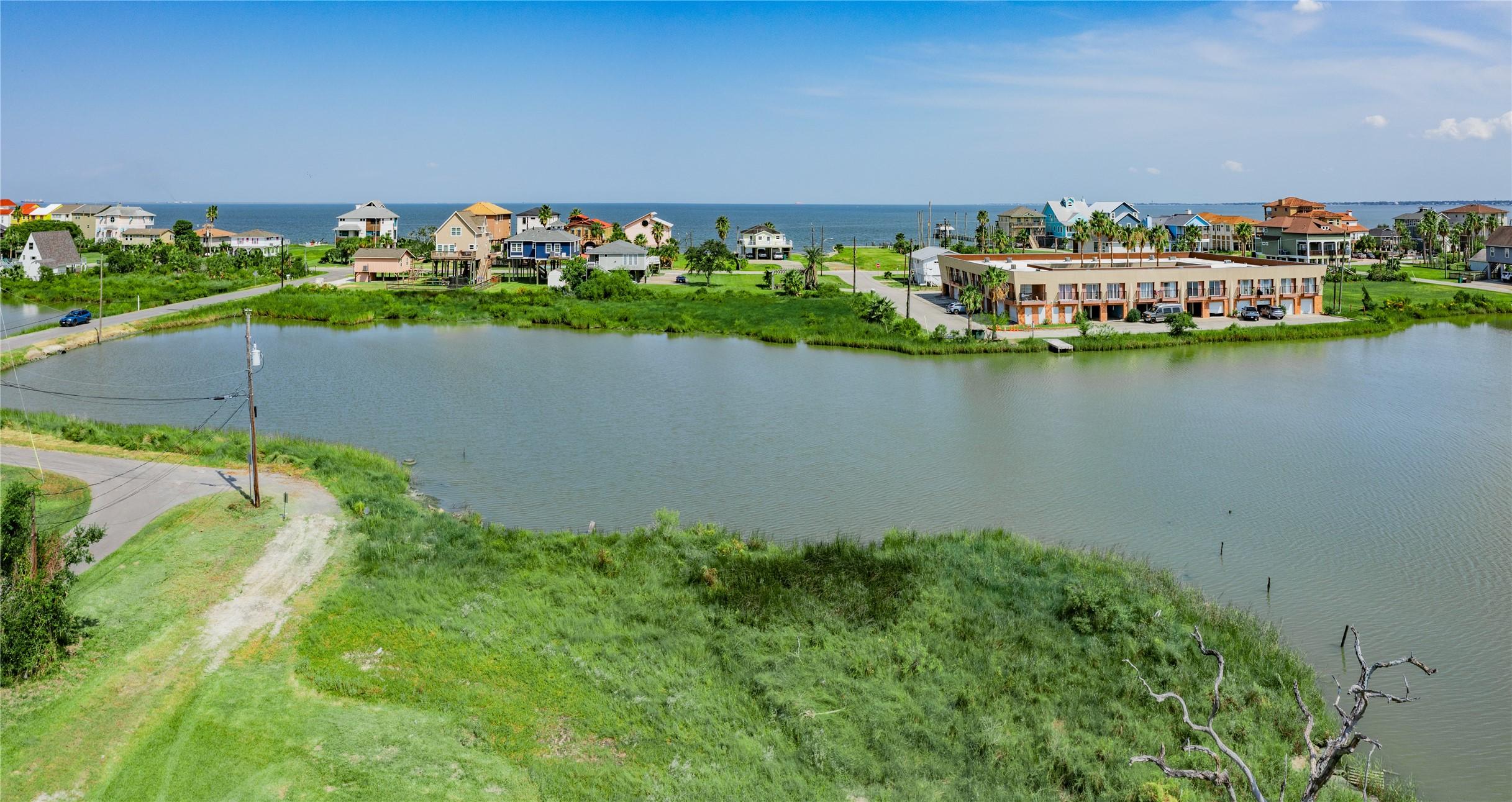 Image 4: This aerial photo showcases a picturesque waterfro