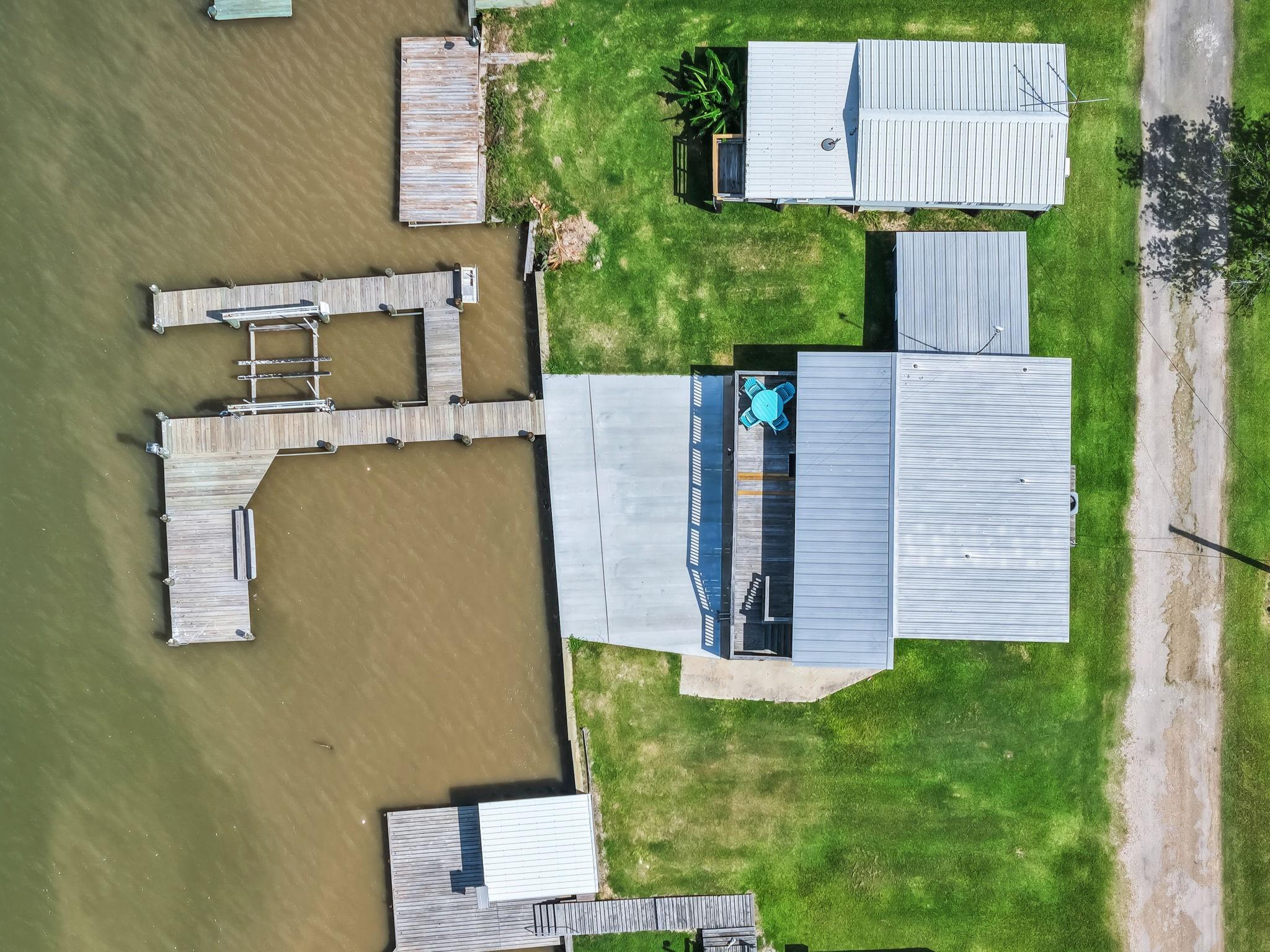 Image 2: This aerial view highlights the property's direct