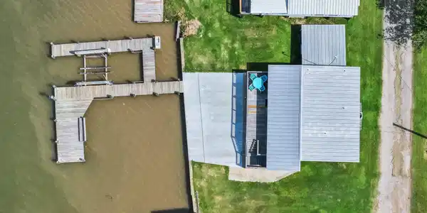 Image 2: This aerial view highlights the property's direct