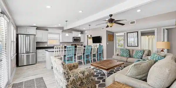 Image 4: Step inside to a bright, open living space that fl
