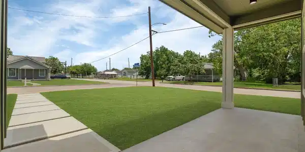 Image 3: Spacious covered front patio, perfect for relaxing