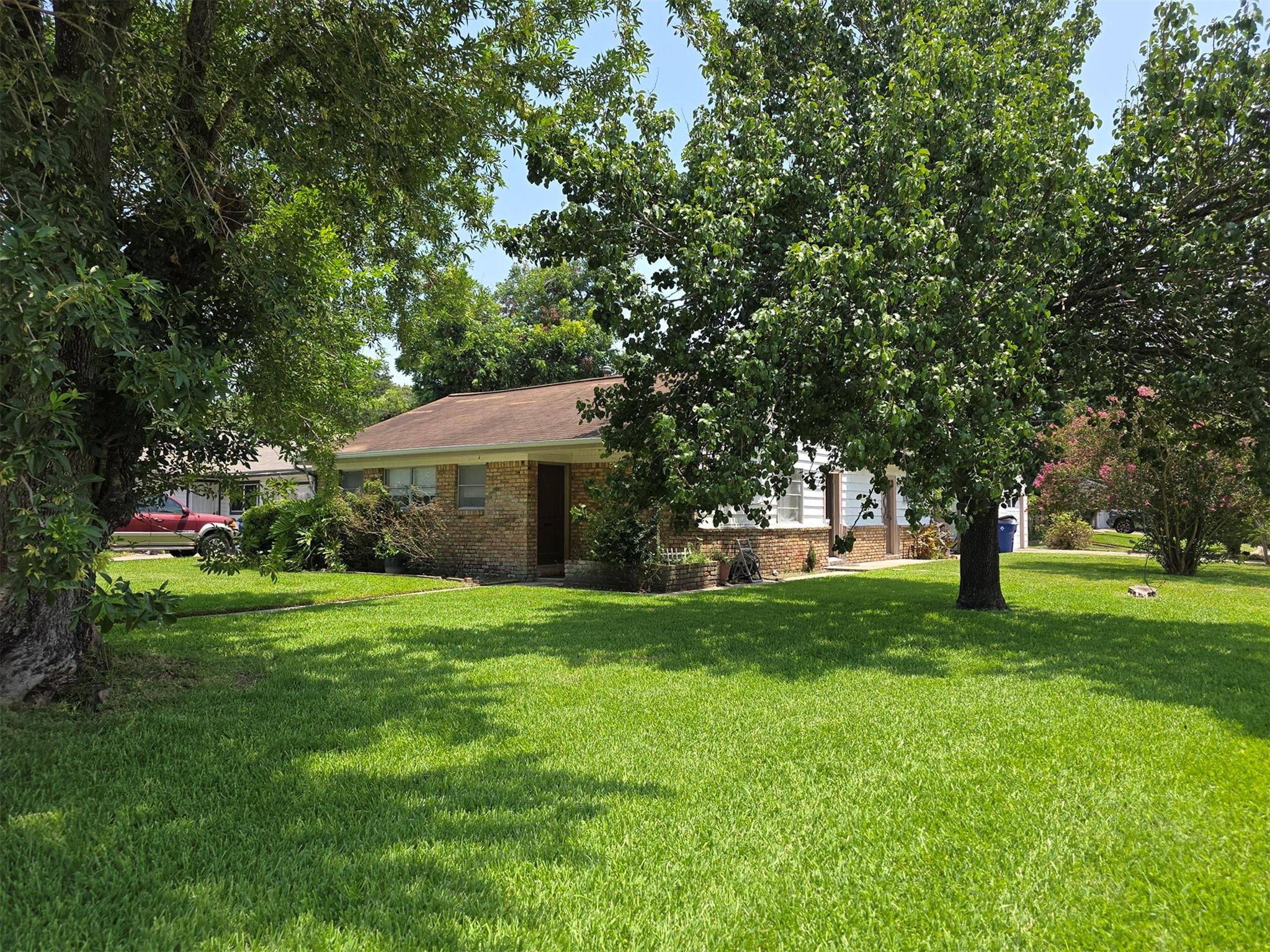 Image 1: Corner lot home near local schools, playgrounds, t