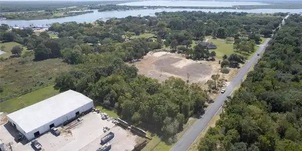 Image 4: Drone showing wooded property