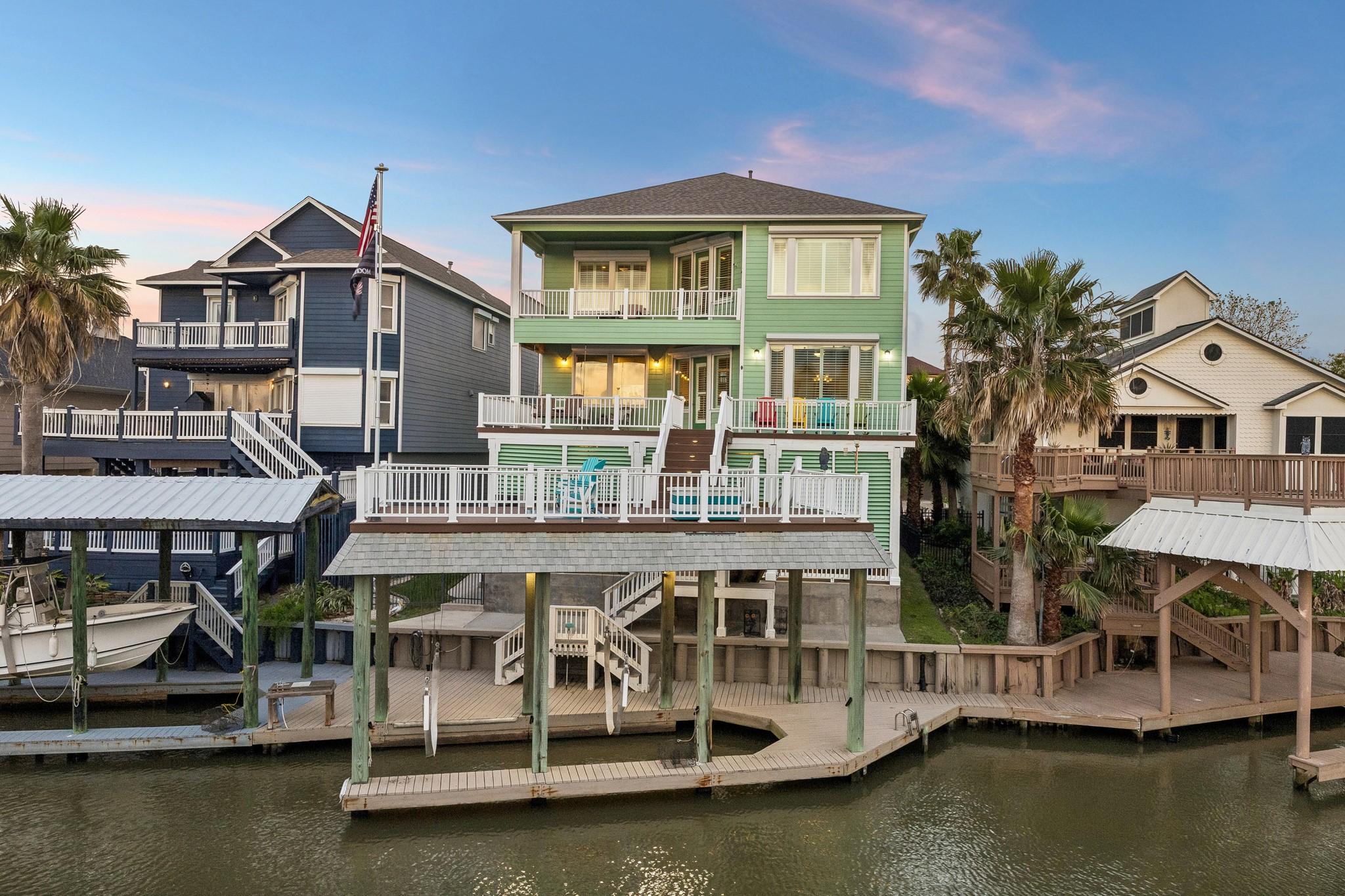 Image 3: WATERSIDE VIEW HIGHLIGHTS THE BOATHOUSE & IT'S ROO