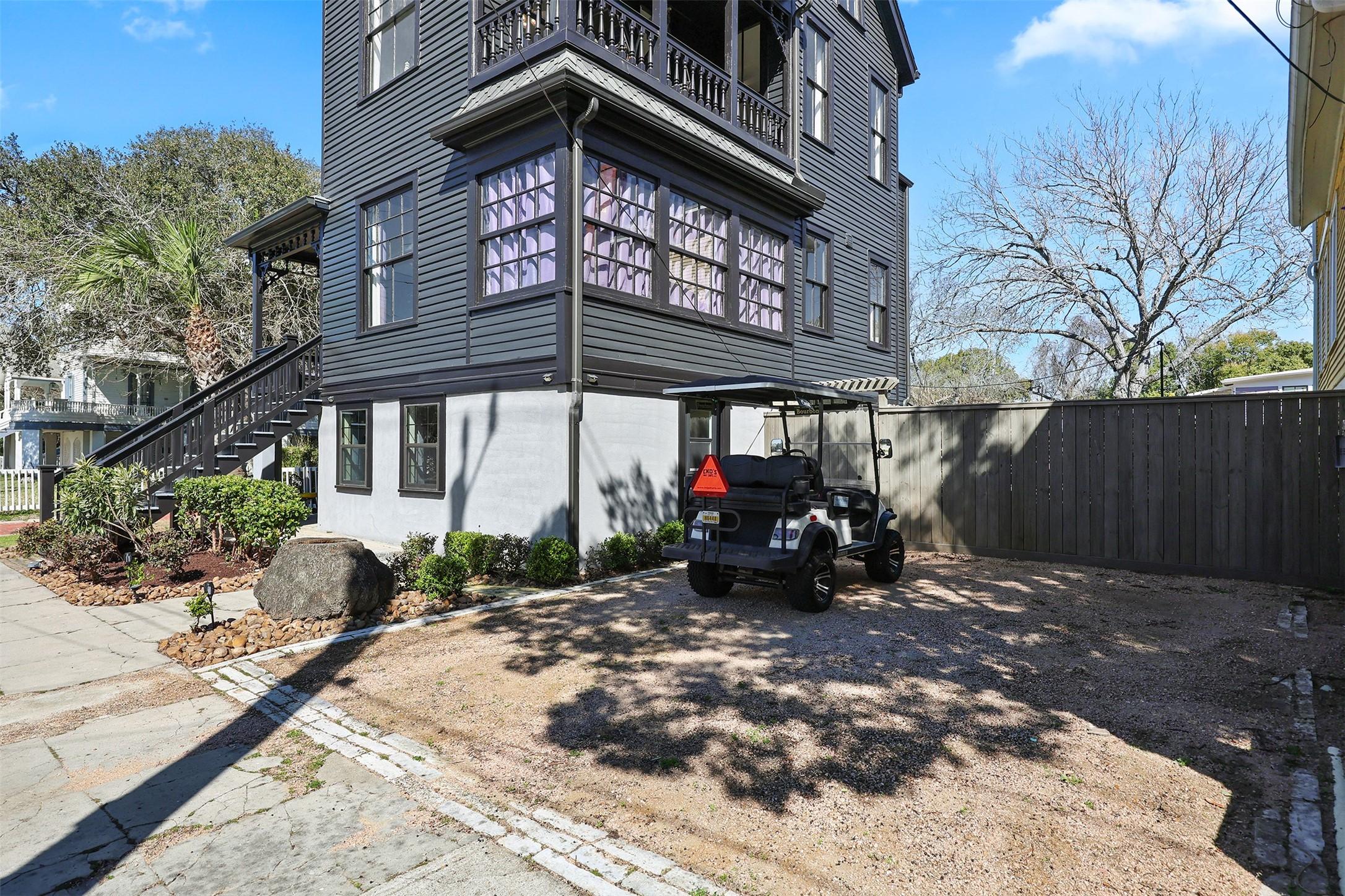 Image 2: Off-street parking for two cars and a golf cart.