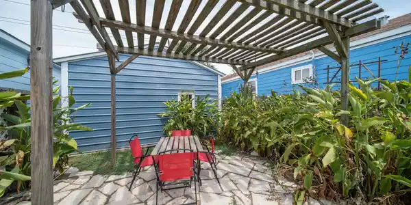 Image 2: A private outdoor seating area under a beautiful w