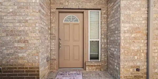Image 4: Side entry door for privacy. This home comes with