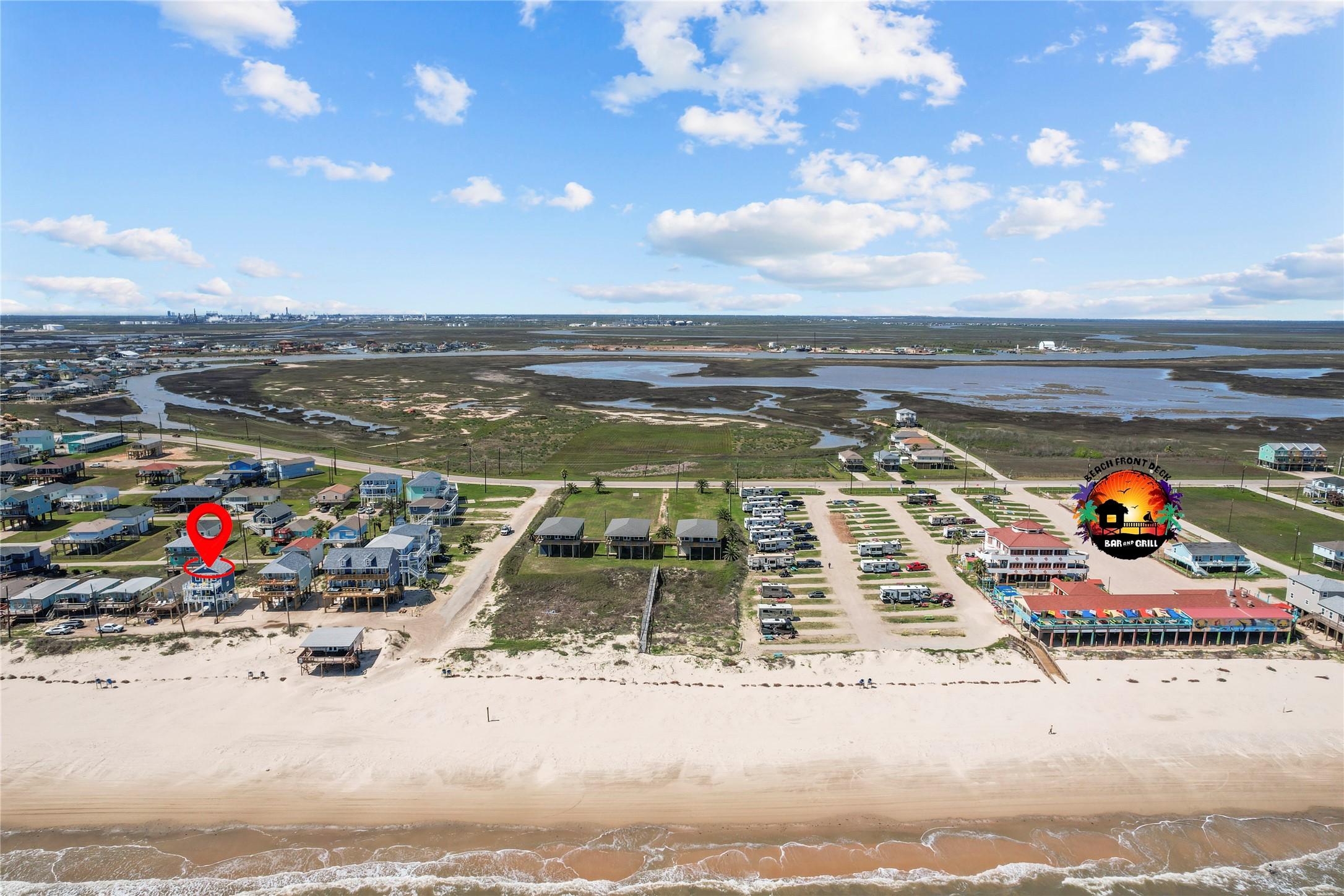 Image 3: Close proximity to the  Beachfront Bar & Grill.