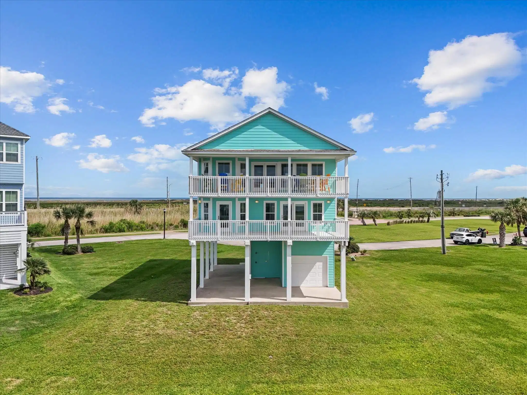 Image 1: This stunning coastal home welcomes you with time