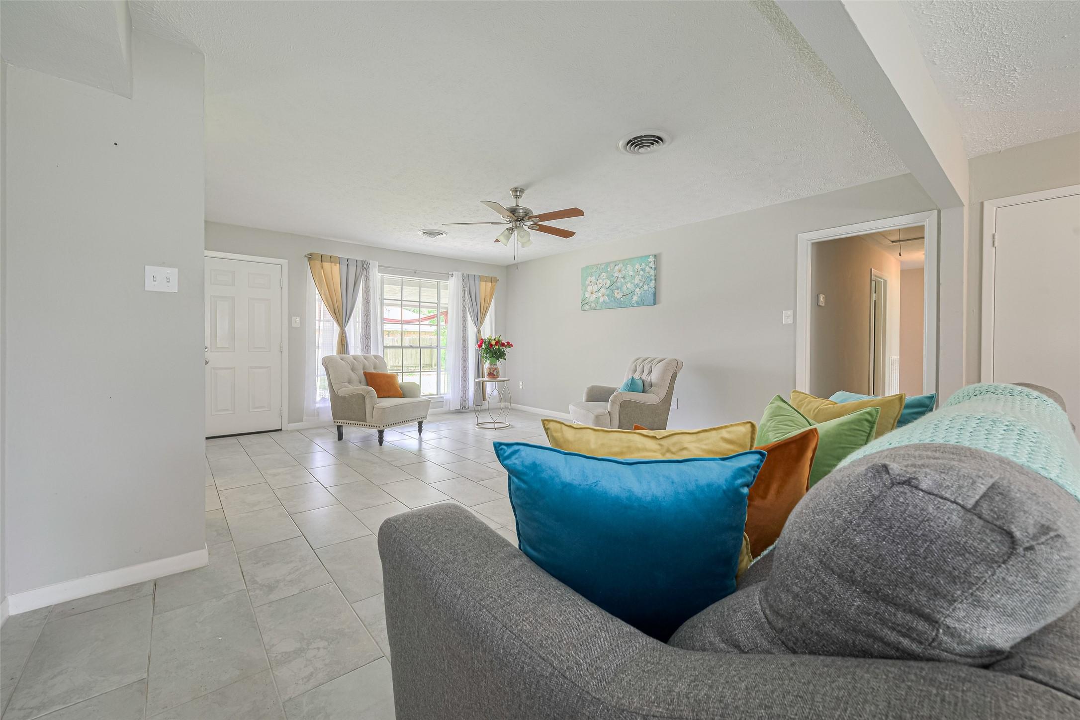 Image 4: Step into a warm and inviting sitting area where g