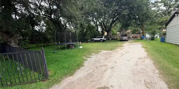 Image 2: The existing driveway provides convenient access t