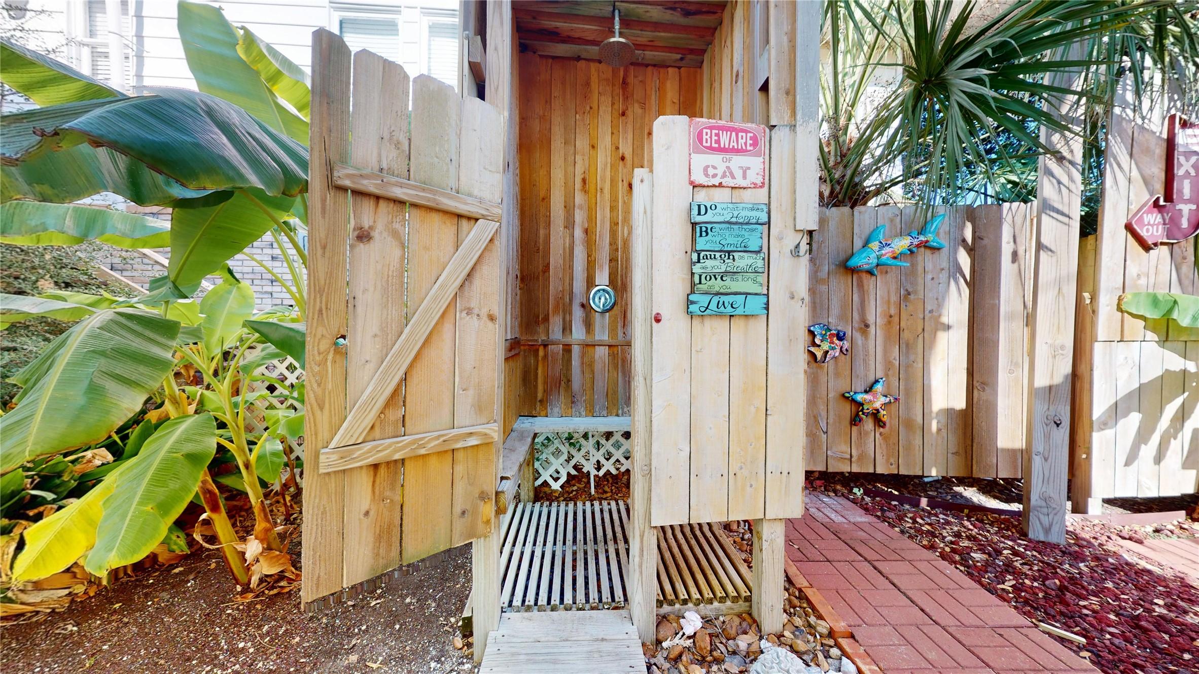 Image 4: Custom Outdoor shower! Makes cleaning up after the