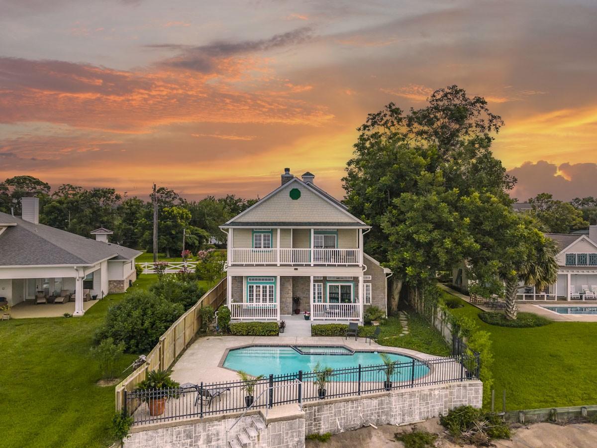 Image 1: Situated in the quiet community of Bayview  this h