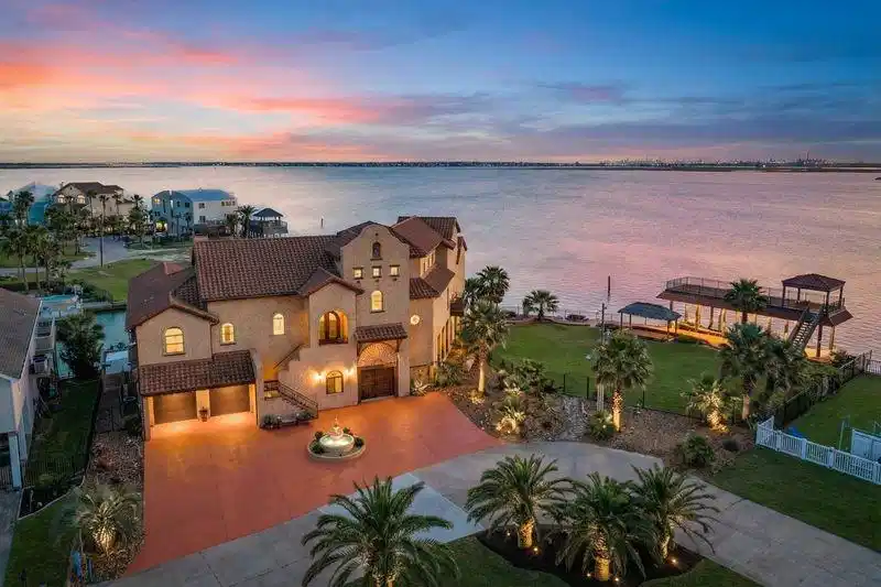 Image 1: Beautiful bay, waterfront views with a home on 2 l