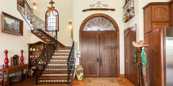 Image 4: Front door and beautiful Spanish style steps with