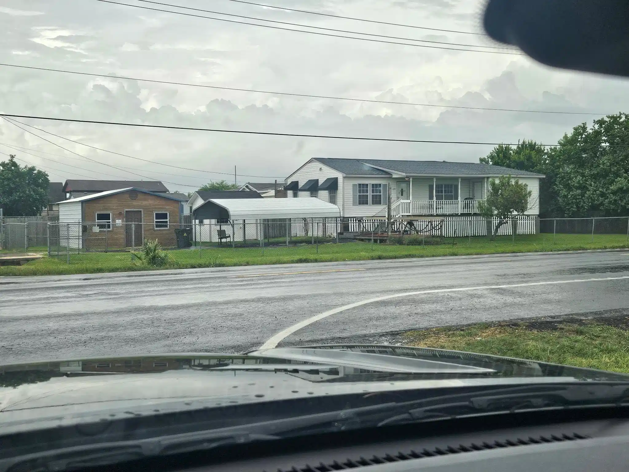 Image 1: Beautiful corner lot. Home and two outbuildings