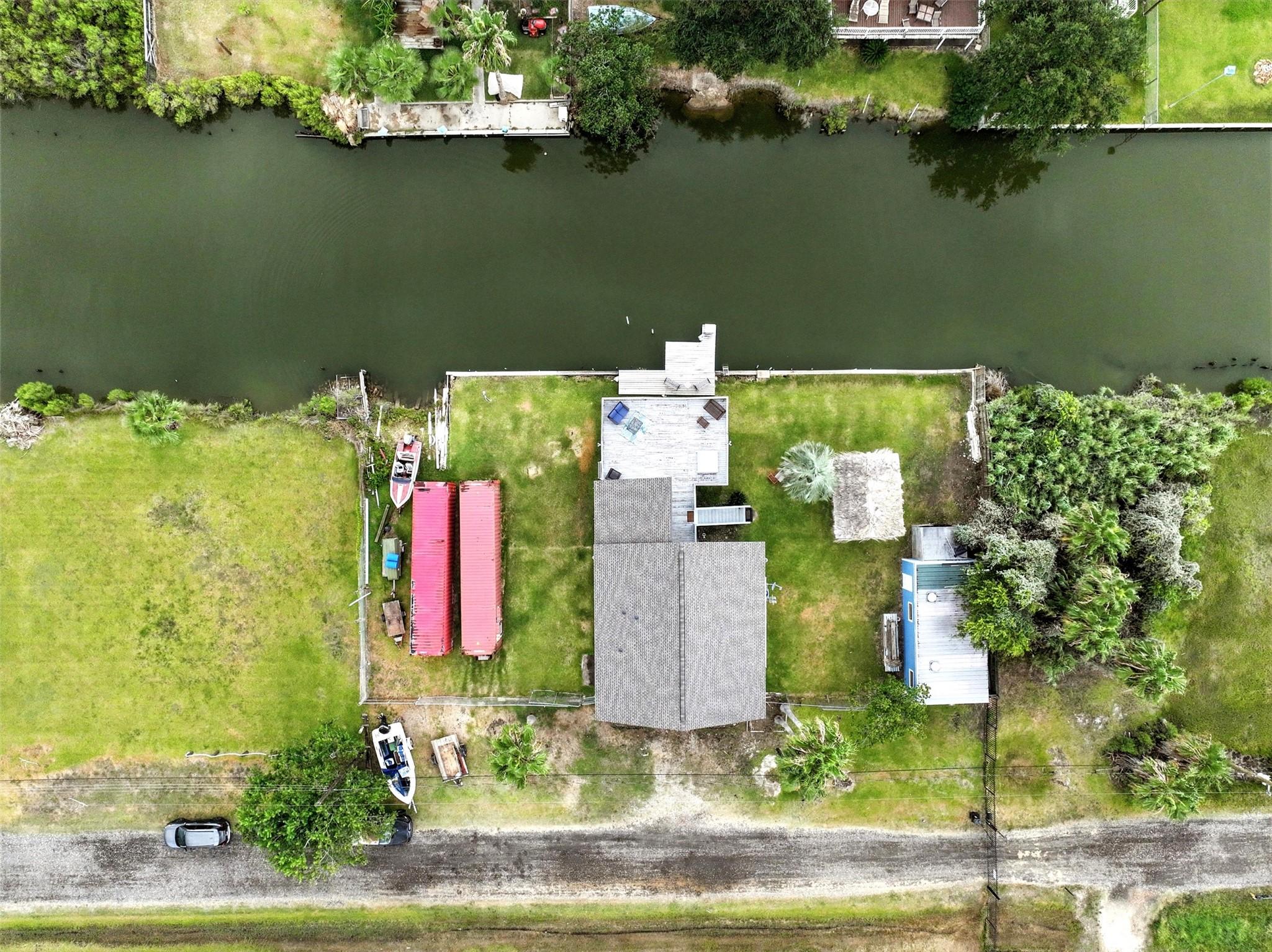 Image 4: aerial view of 3 lots with waterfront footage
