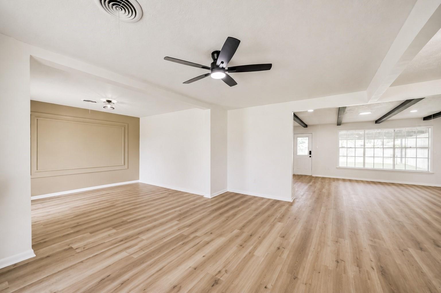 Image 2: open dining room with sitting area