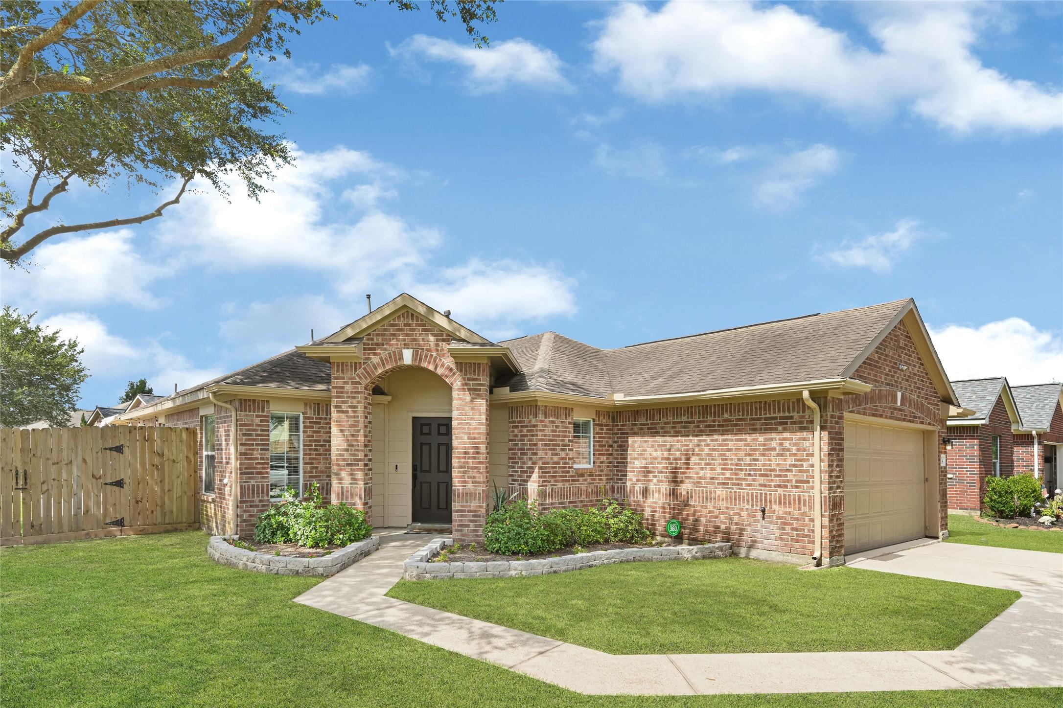 Image 2: Situated on a quiet corner lot with beautiful, mat