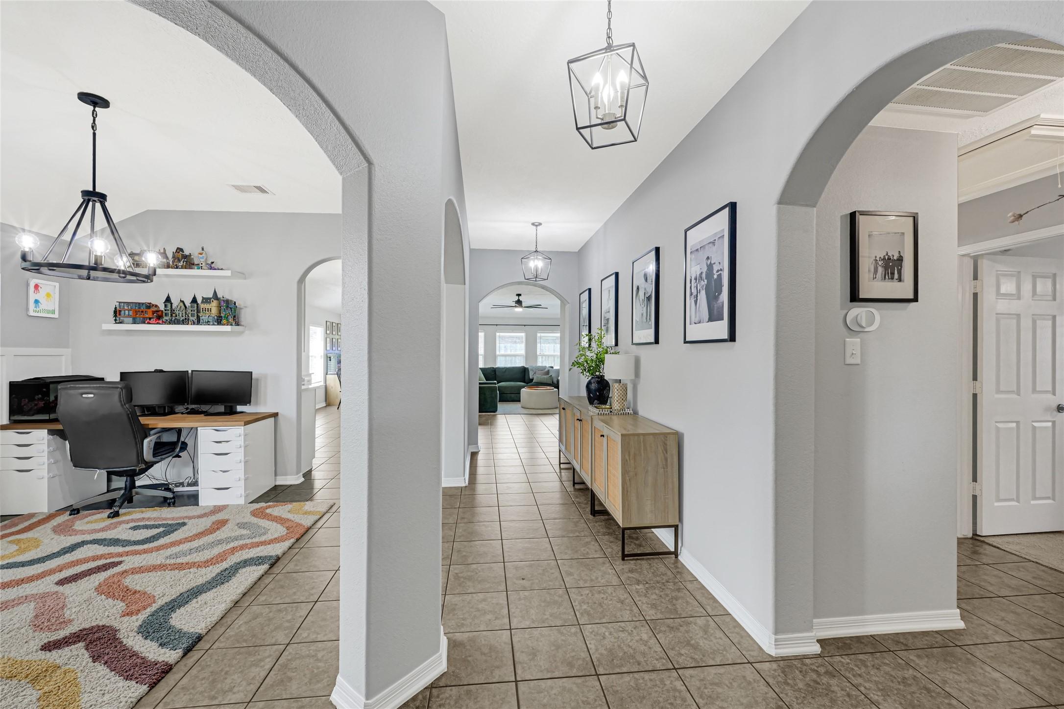 Image 4: Enter into the home greeted by a formal dining roo