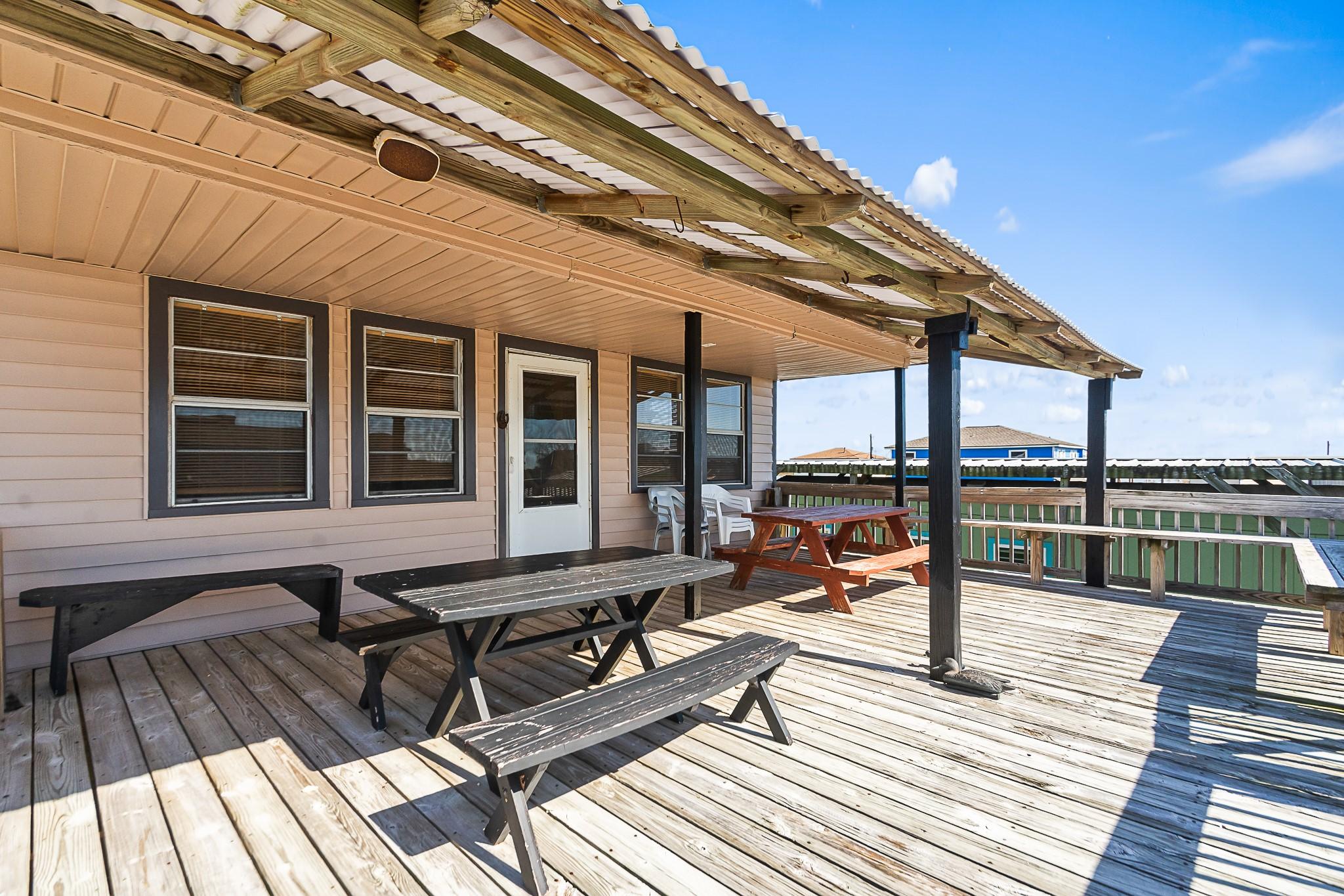 Image 2: Covered deck overlooking the canal