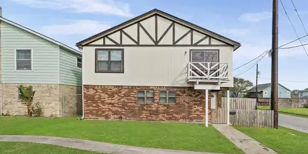 Image 2: South facing front facade with classic charm, fron