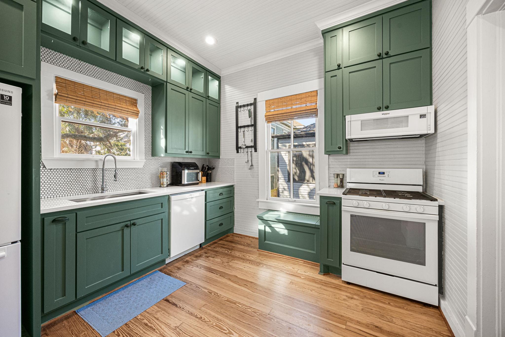 Image 2: 2nd floor - This kitchen features elegant beachy-g
