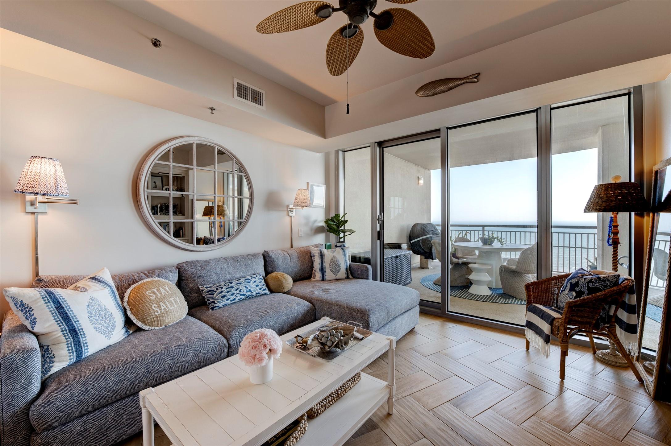 Image 4: The main living area features beautiful herringbon