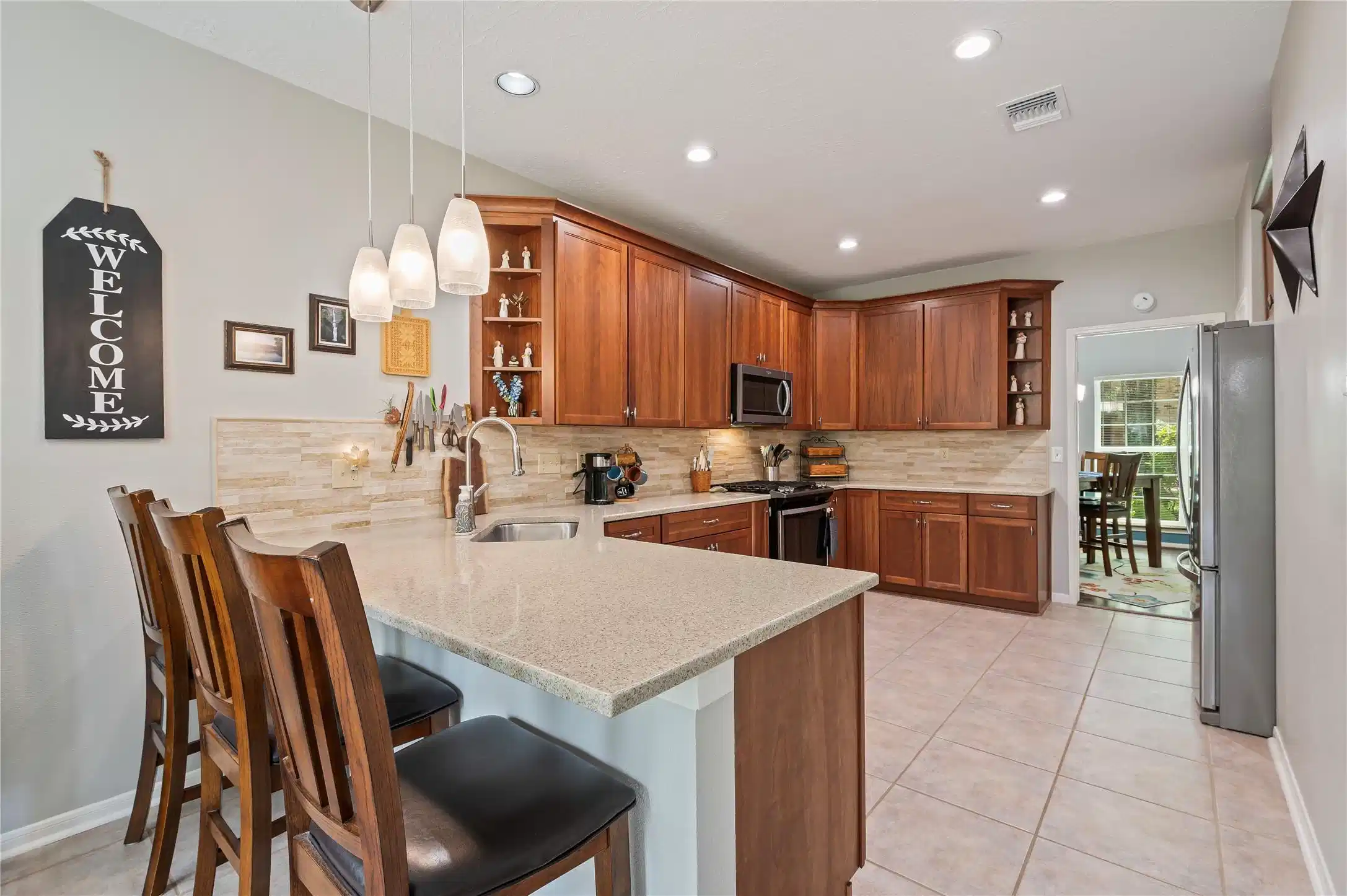 Image 1: Welcome to this gorgeous townhome boasting high-en