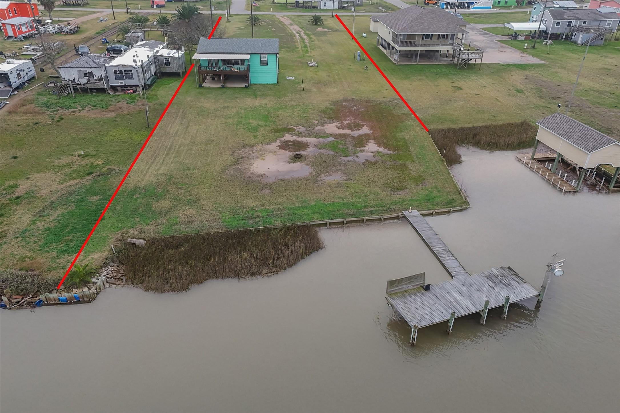 Image 4: Aerial view of the back of the property on the San