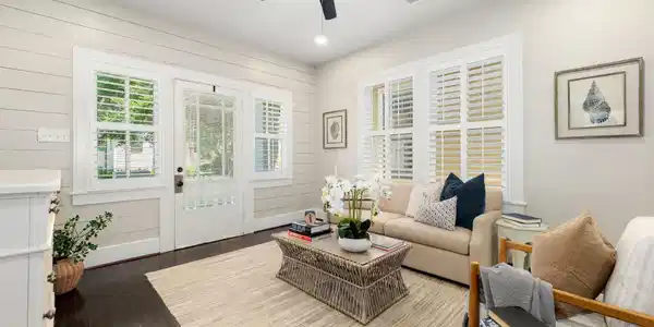 Image 4: Plantation shutters and classic millwork frame thi