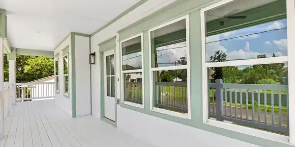 Image 2: Covered deck. Plenty of room to enjoy the bay bree