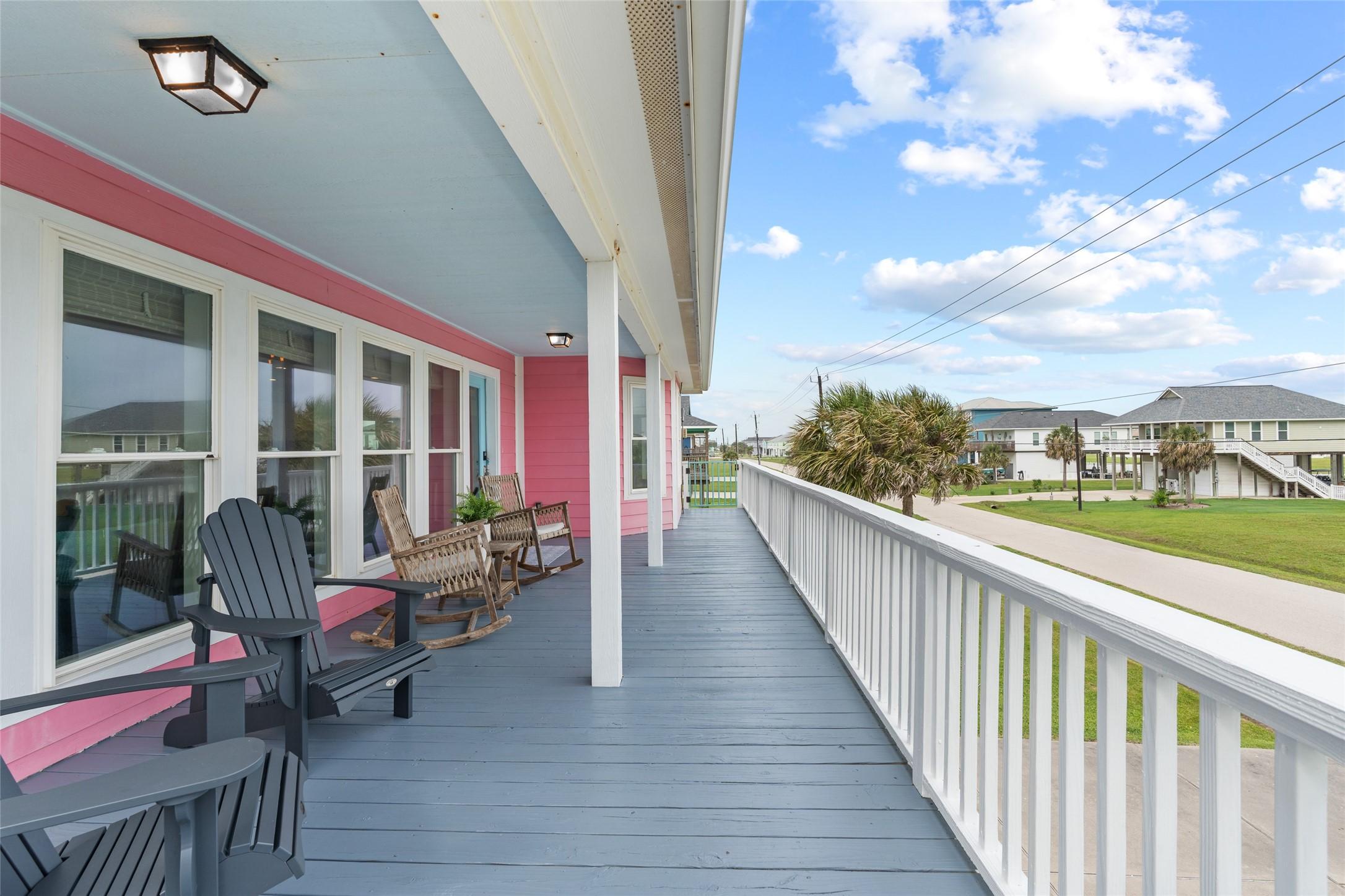 Image 2: This inviting home features a spacious, full lengt