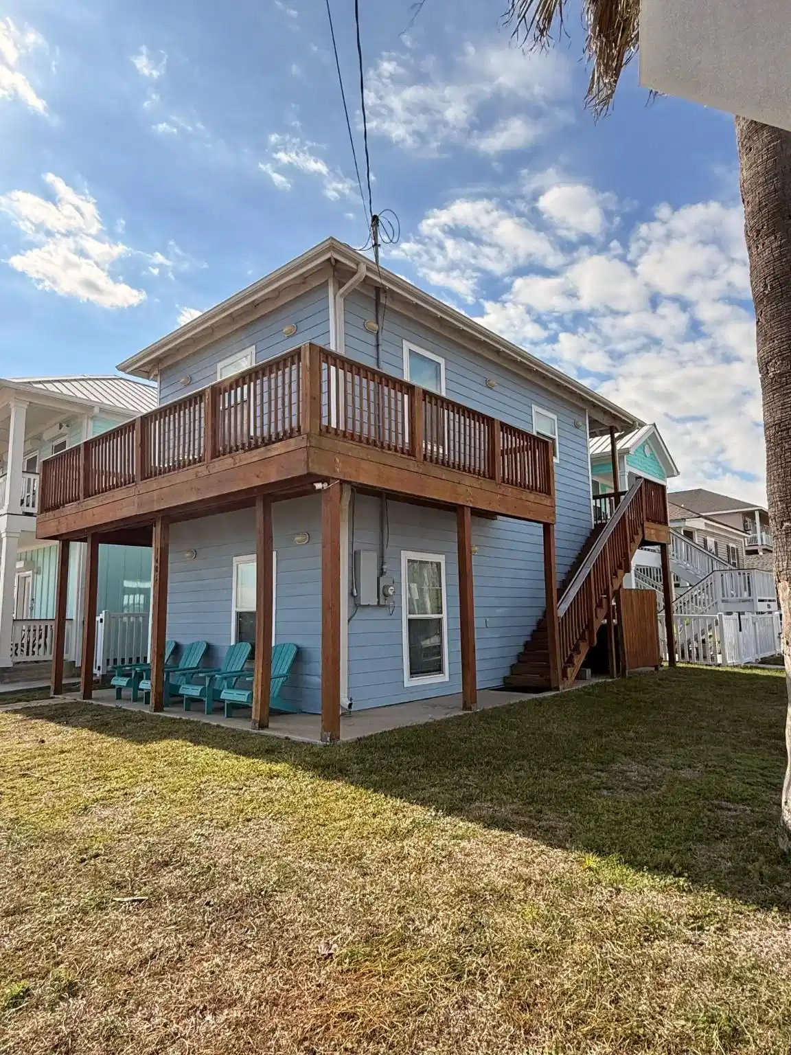 Image 1: This charming two-story home features a spacious w