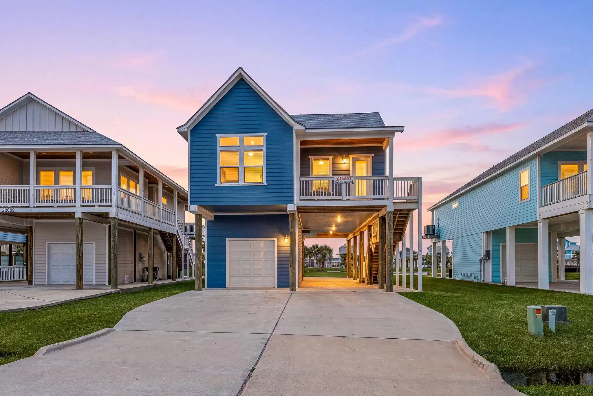 Image 1: Charming beach house exterior with inviting coasta