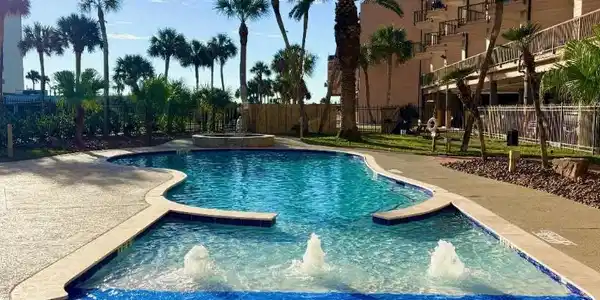 Image 2: The heated pool now has a jacuzzi and bubbly water