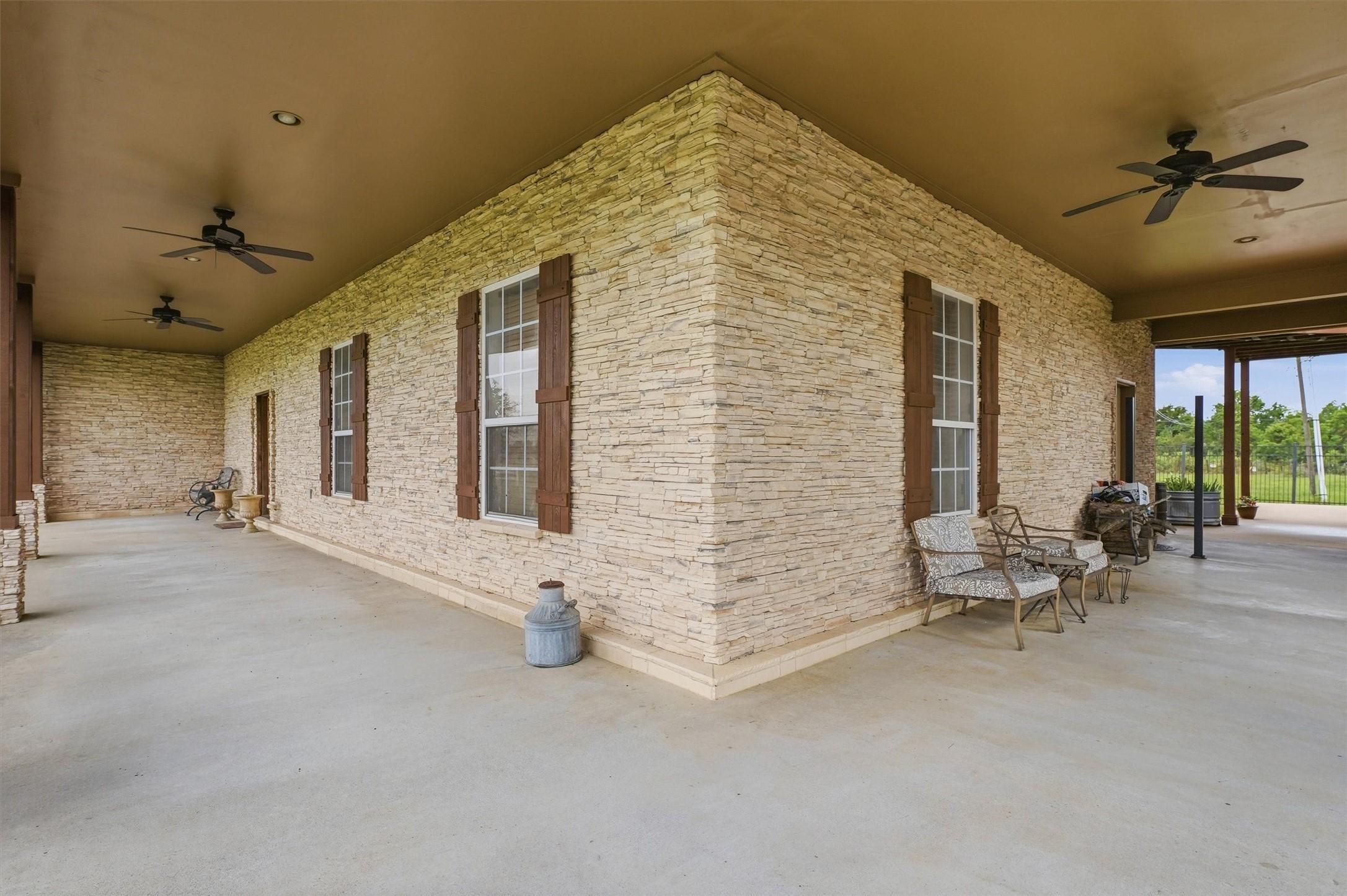 Image 3: Expansive wraparound porch perfect for outdoor rel