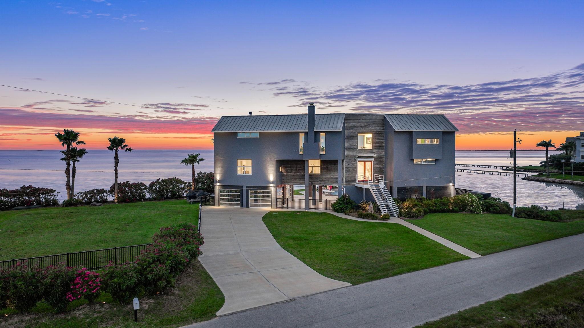 Image 1: Welcome home to your new bay house with tons of fe