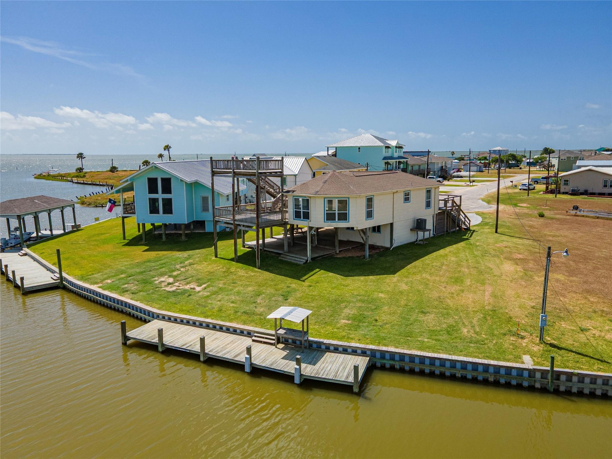 Image 1: This waterfront property offers a unique, elevated