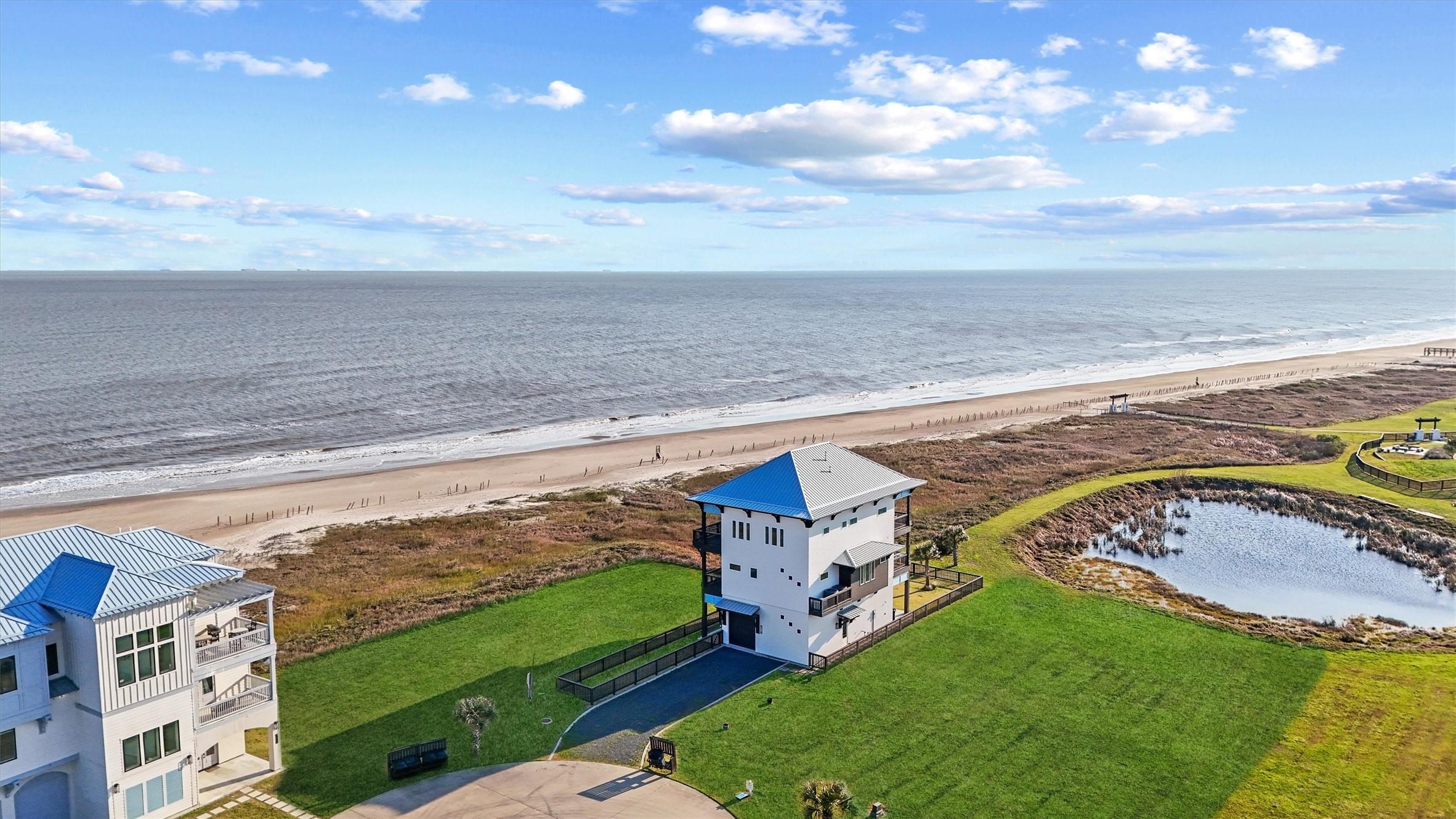 Image 1: Stunning coastal home with unobstructed Gulf views