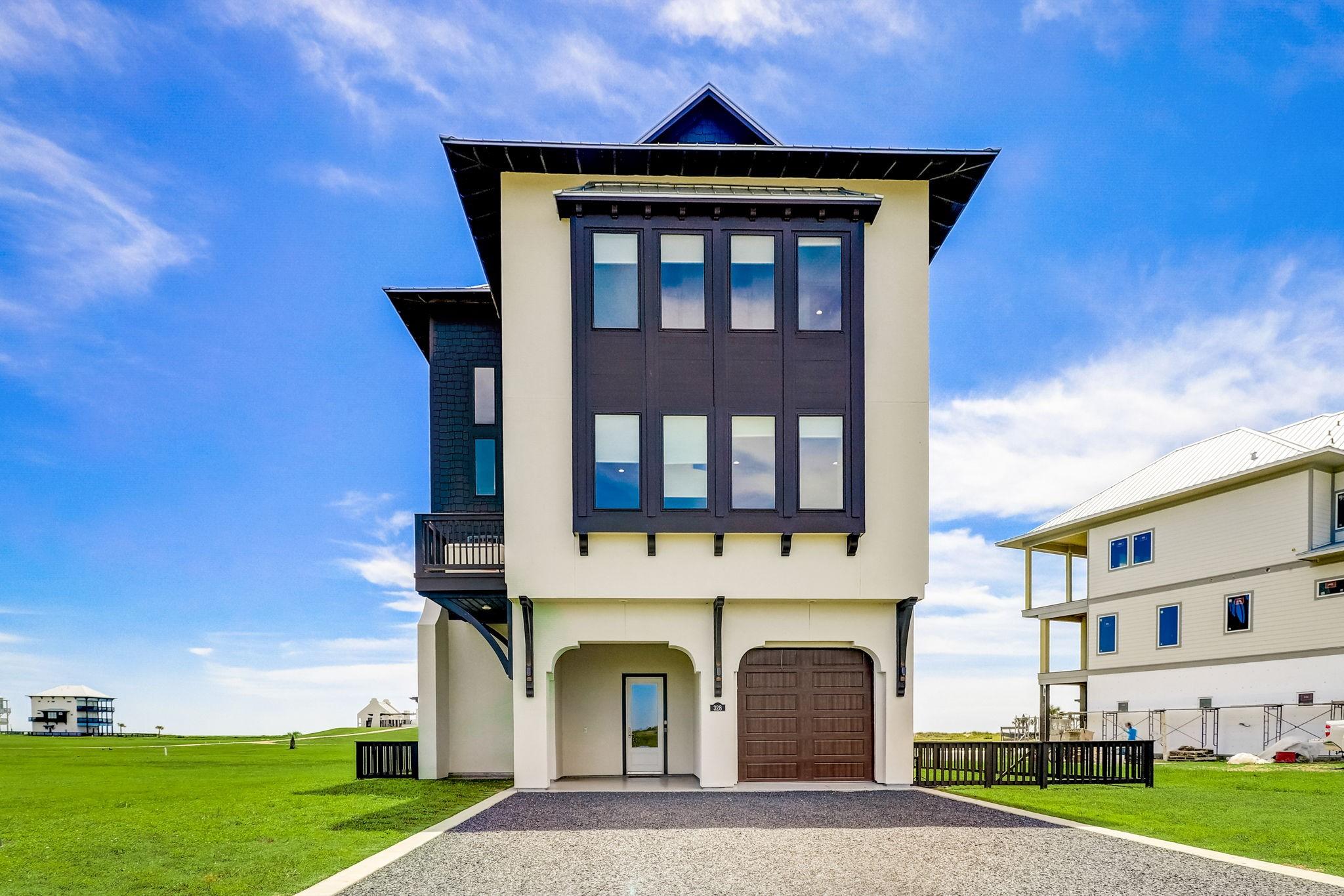 Image 3: Front elevation featuring clean lines, oversized w