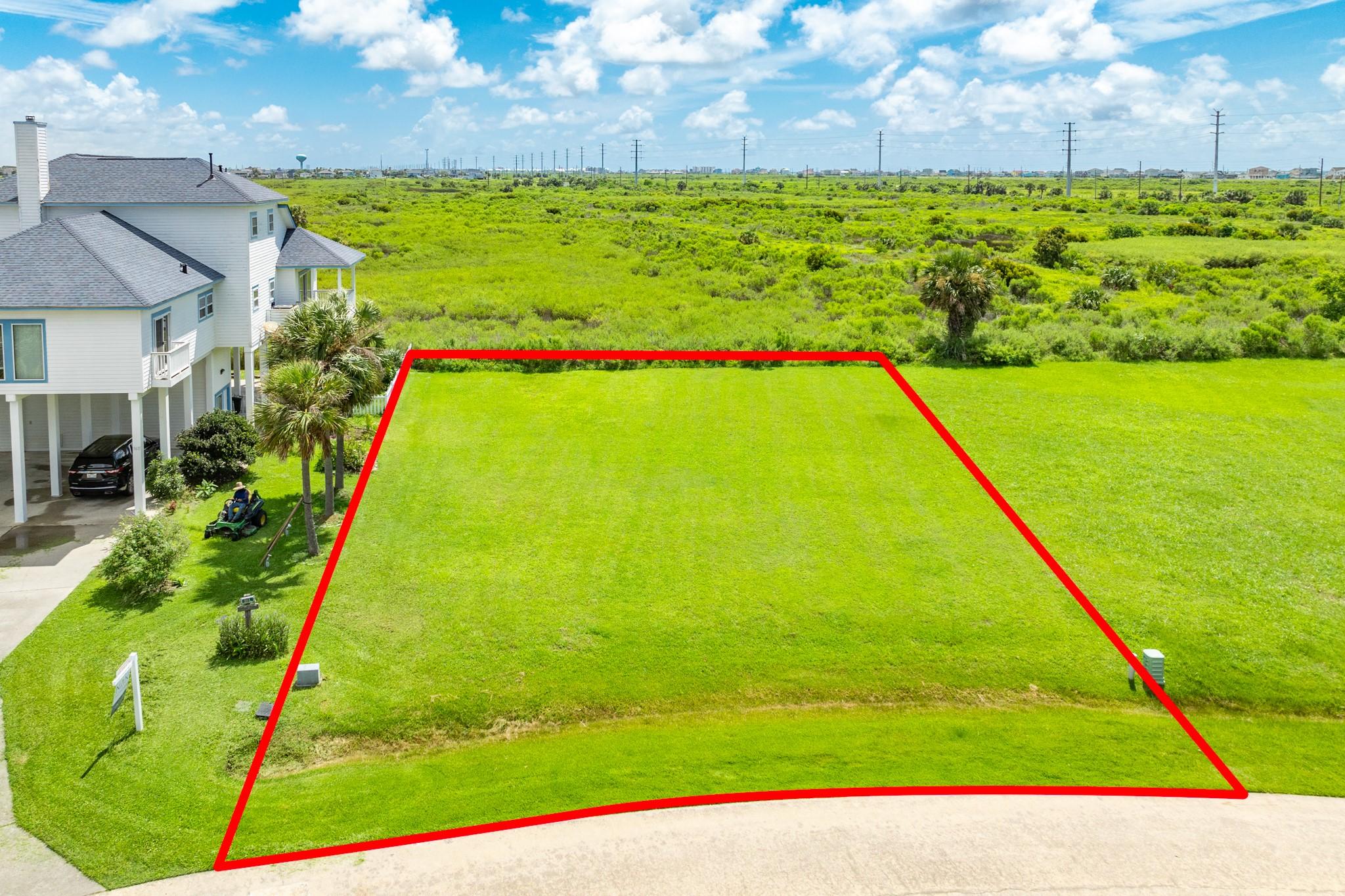 Image 2: Aerial view of lot with property boundaries superi