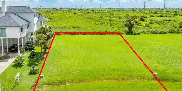 Image 2: Aerial view of lot with property boundaries superi