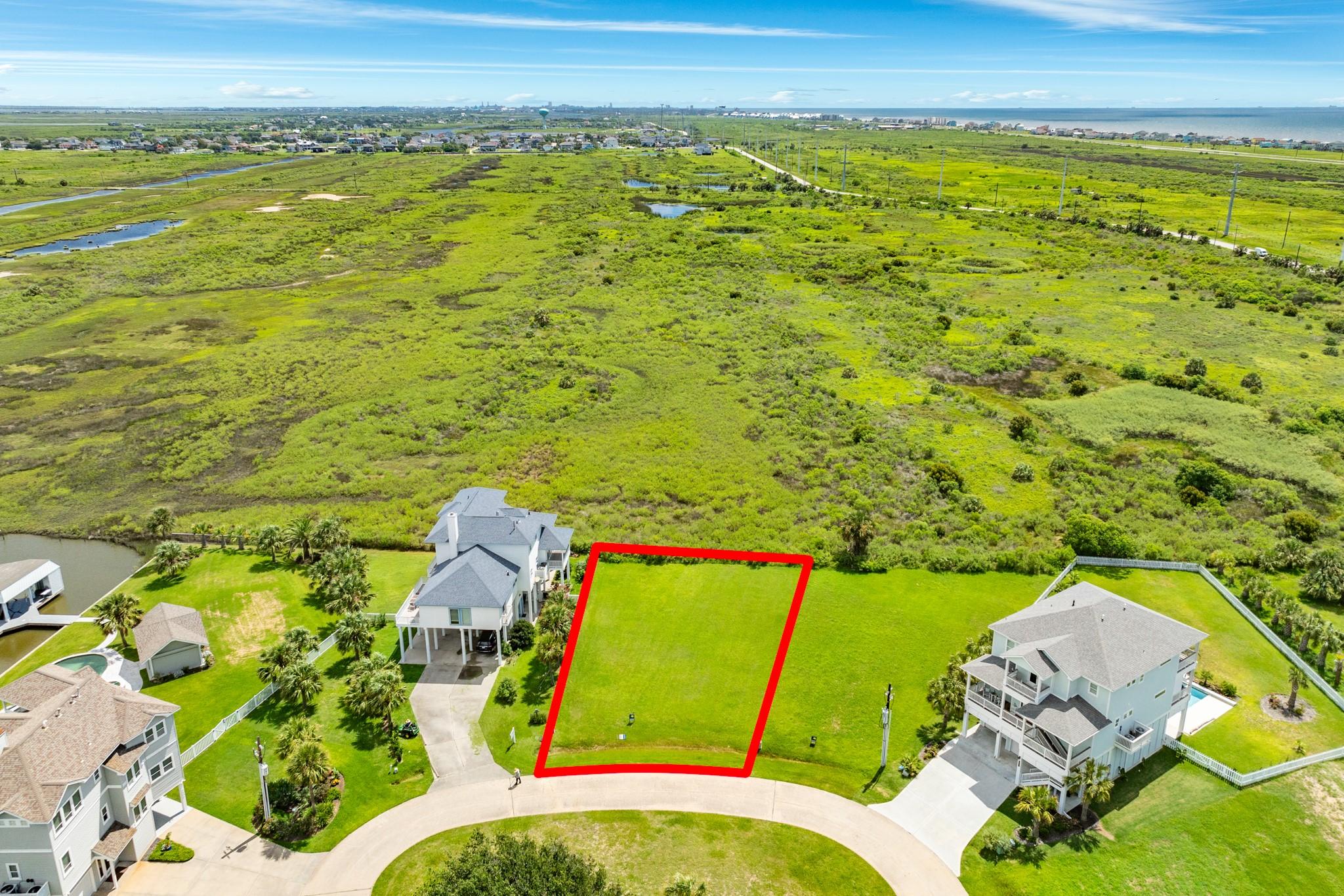 Image 3: Aerial view of lot with boundary lines outlining t