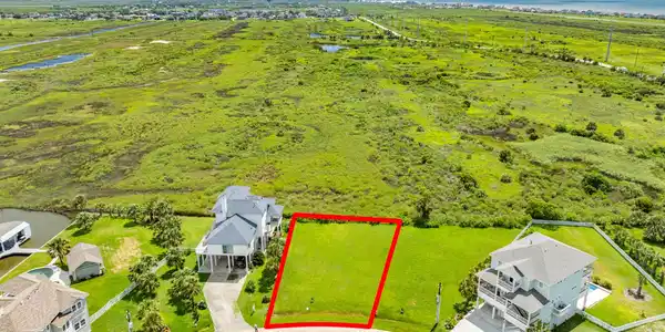 Image 3: Aerial view of lot with boundary lines outlining t